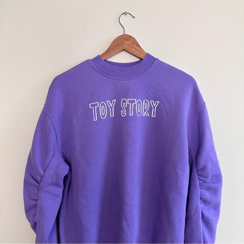 H&M Disney and Pixar Toy Story Rex Sweatshirt